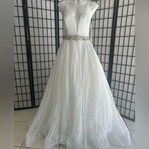 Elegant Glittery White Gown with Silver Accents